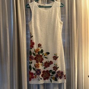 White lace dress with floral design